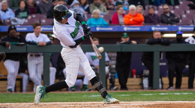 Dragons shortstop Edwin Arroyo connects for a double Tuesday night in his first game at Day Air Ballpark. He later scored for a 2-1 lead. CONTRIBUTED/Jeff Gilbert