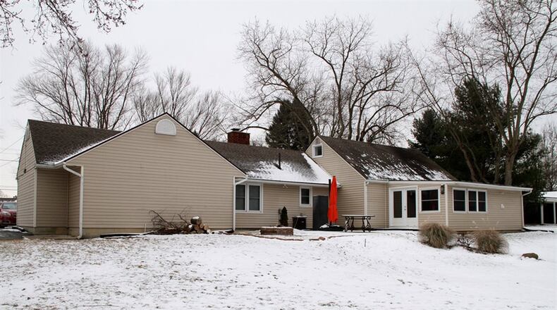 A former sun room has been combined into the renovated kitchen and dining room. The basement has been finished into a kitchenette and media room.
