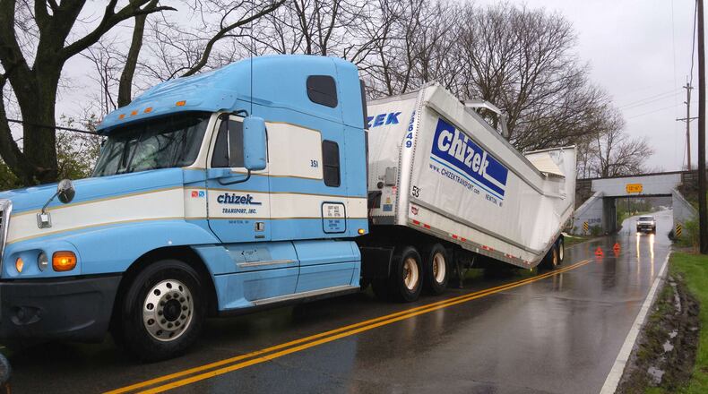 A semi hit a train overpass this afternoon in Franklin. NICK GRAHAM/STAFF