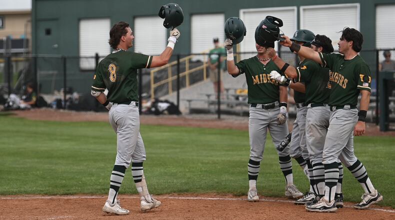 Wright State University sophomore JP Peltier celebrates with teammates during their game on Friday, May 16 at Purdue Fort Wayne. The Raiders won 23-11. JORDAN WOMMACK / CONTRIBUTED PHOTO