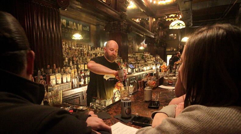 The Century Bar commemorated the last day at its original location, 10 S. Jefferson St., with a day long celebration Dec. 31, 2019. Revelers packed the bar throughout the day and attended a special New Yearâs Eve party with a final toast. The bar, co-owned by Joseph Head and Diane Spitzig, will reopen next door at 18 S. Jefferson St. and is expected to open in the early part of 2020. LISA POWELL / STAFF