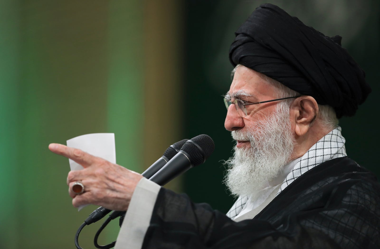 In this photo released by an official website of the office of the Iranian supreme leader, Supreme Leader Ayatollah Ali Khamenei speaks during a meeting with teachers, in Tehran, Iran, Saturday, May 17, 2025. (Office of the Iranian Supreme Leader via AP)