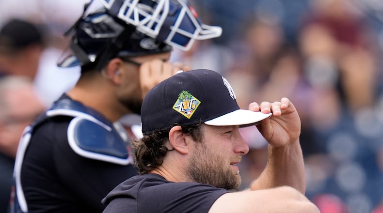 New York Yankees pitcher Gerrit Cole watches batting practice during a spring training baseball workout Monday, Feb. 16, 2026, in Tampa, Fla. (AP Photo/Chris O'Meara)