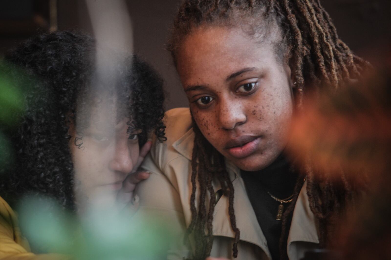Daj'za Demmings, right and her stepdaughter, Adrielle Tolentino enjoy time together at Wholly Grounds Coffee House in Dayton. Demmings was called "a true community servant" by one of the three individuals who nominated her to be profiled in the Dayton Inspires section.