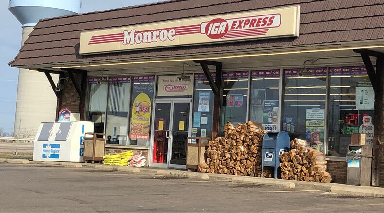 The Monroe IGA Express store is under a FDA suspension to sell tobacco products for about 30 days for repeated violations of selling tobacco to underage people. RICK MCCRABB/STAFF
