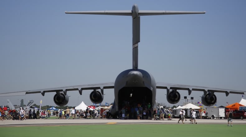 The giant C-17 Globemaster dominates the display area at the Vectren Dayton Air Show on Sunday. TY GREENLEES / STAFF