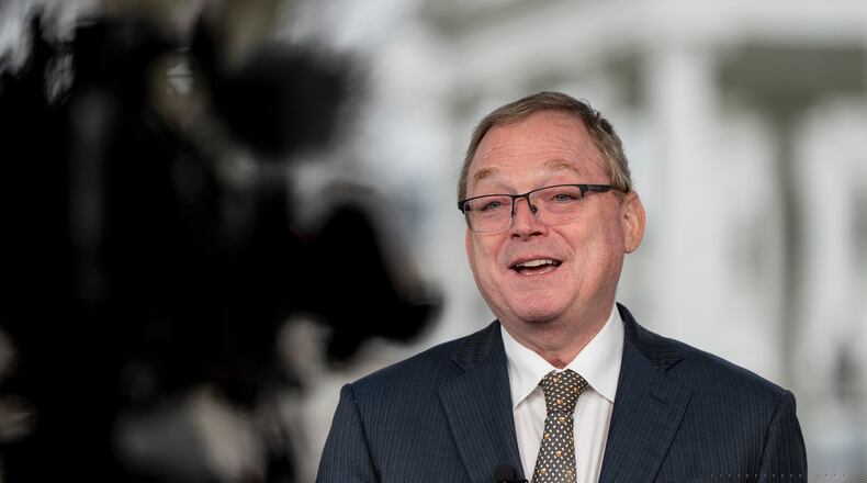 Director of the National Economic Council Kevin Hassett does a television interview at the White House, Wednesday, Dec. 10, 2025, in Washington. (AP Photo/Alex Brandon)