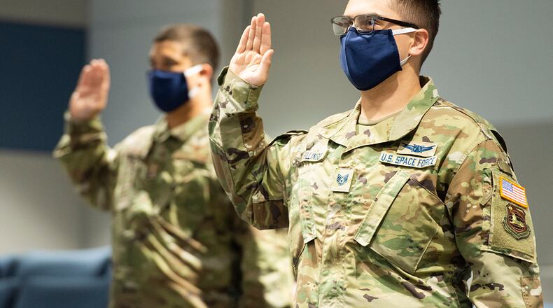 Staff Sgt. Benjamin Fillinger, assigned to the National Air and Space Intelligence Center, participates in a virtual U.S. Space Force commissioning and enlistment ceremony led by USSF Chief of Space Operations Gen. John W. Raymond Sept. 15. U.S. Air Force photo/Wesley Farnsworth
