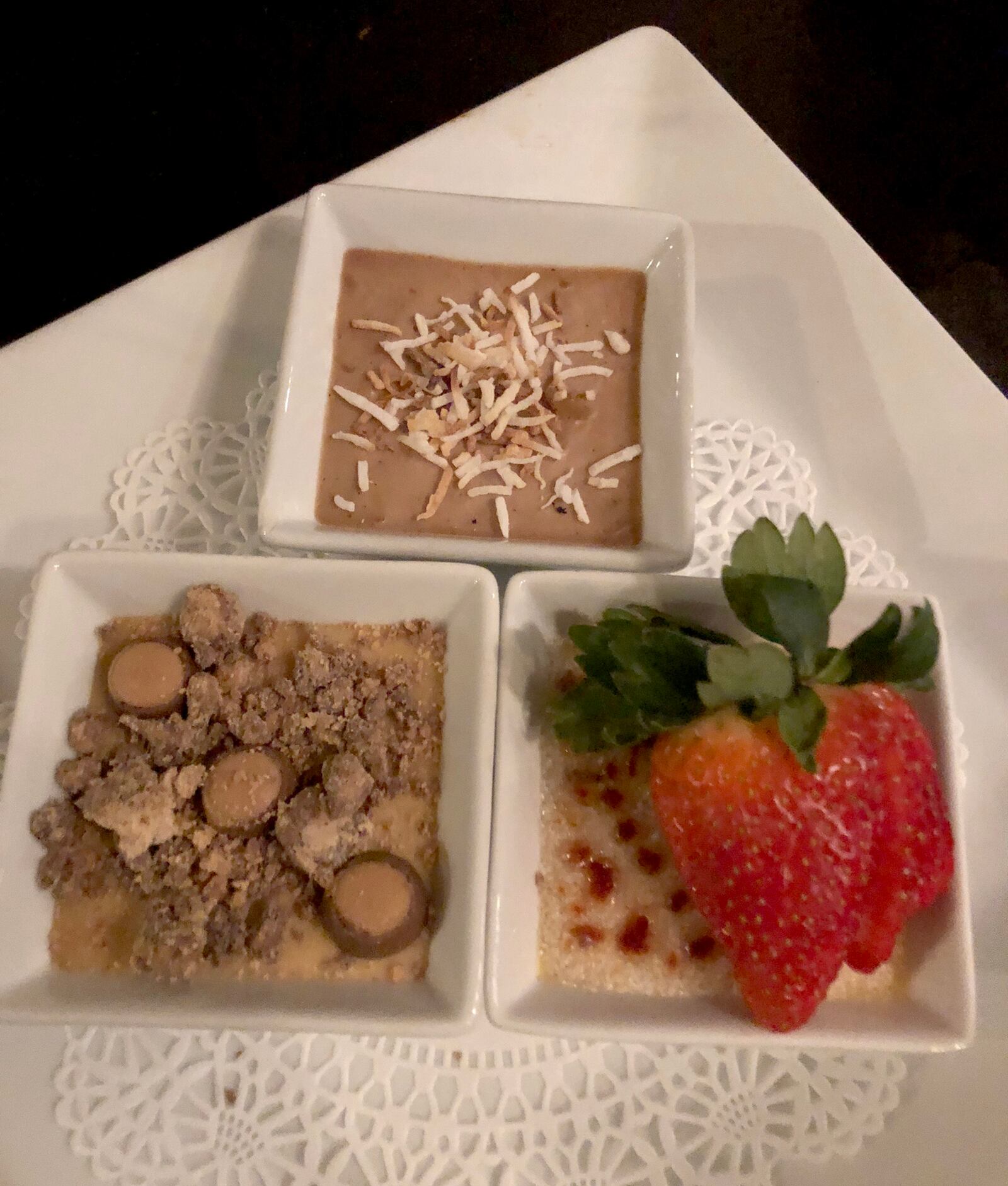 Dayton Club's creme brulee trio. The selection changes every few weeks. This trio is themed after candy bars: