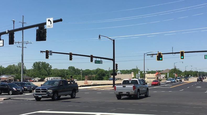 Traffic is flowing through the intersection of Ohio 741 and Ohio 73 in Springboro, as $10 million in road work is winding up. STAFF/LAWRENCE BUDD