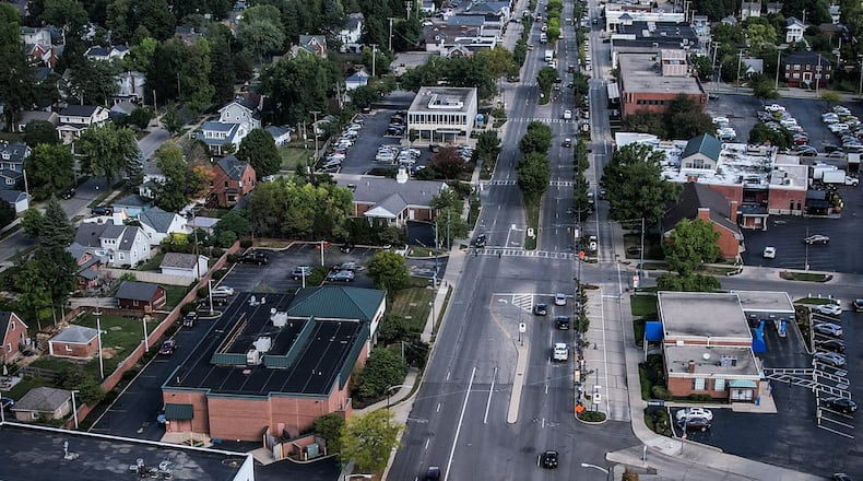 This is an aerial photo of Far Hills Avenue (Ohio 48) looking north from East Dorothy Lane in Oakwood. Ohio 48 includes 10 of Oakwood’s 17 traffic signals, most of which have not been assessed or upgraded in more than 25 years, according to City Manager Norbert Klopsch. The city of Dayton is in the background on the left. JIM NOELKER/STAFF