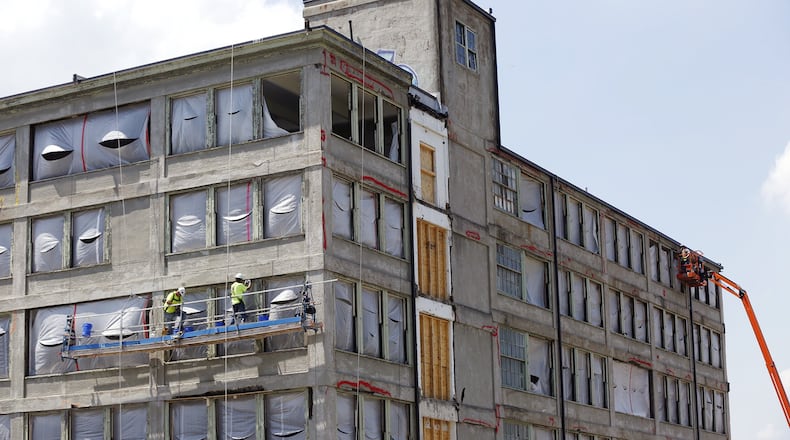 The long anticipated transformation of the Dayton Motor Car building has begun. Miller-Valentine Construction announced Tuesday morning that it is renovating the building to provide office space for Gosiger Inc. and other companies in what Miller-Valentine called Dayton’s “East Oregon Innovation District.” TY GREENLEES / STAFF