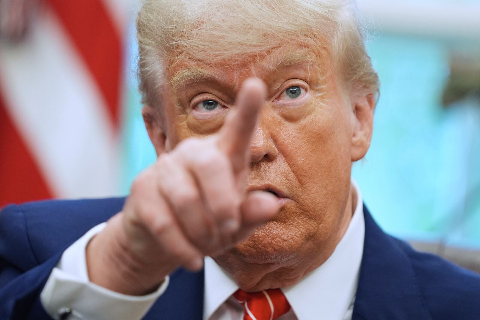 FILE - President Donald Trump gestures as he speaks with reporters in the Oval Office of the White House, May 8, 2025, in Washington. (AP Photo/Evan Vucci, FIle)