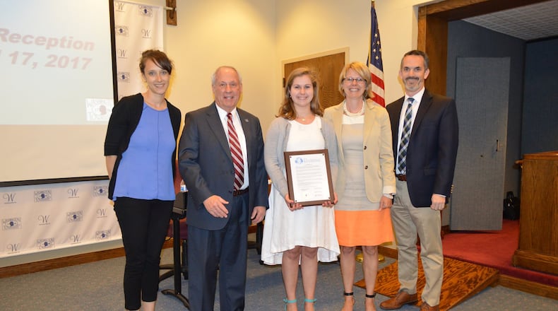 From left: Interact Club Advisor Elizabeth Cameron; Dale Berry, Washington Twp. Board of Trustees vice chair; Noe Camp; Sofie Ameloot, Noe’s mother; Board President Scott Paulson. CONTRIBUTED