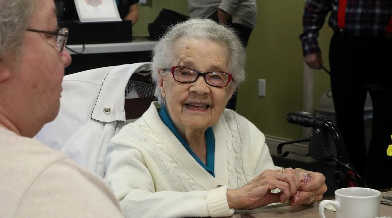 Winona Brigode shares a laugh with Betty Jane Gardner at lunch time in the dinning room at the Ohio Masonic Home. BILL LACKEY/STAFF