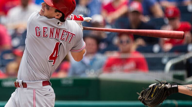 WASHINGTON, DC - JUNE 25: Scooter Gennett #4 of the Cincinnati Reds hits a RBI single scoring Billy Hamilton #6 (not pictured) in the first inning during a game against the Washington Nationals at Nationals Park on June 25, 2017 in Washington, DC. (Photo by Patrick McDermott/Getty Images)