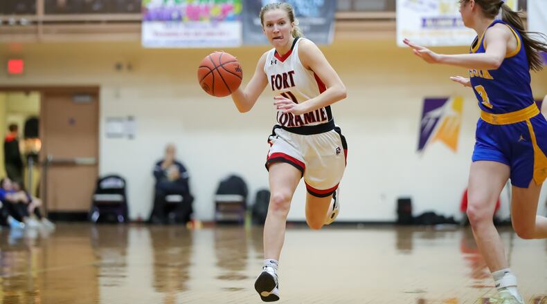 Fort Loramie High School senior Ava Turner drives to the basket during their Division IV regional semifinal game on Thursday night at the Vandalia Butler Student Activity Center. CONTRIBUTED PHOTO BY MICHAEL COOPER