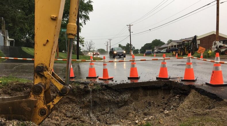A major project to widen Dayton-Xenia Road and add sidewalks is ongoing in the city of Beavercreek. Richard Wilson/Staff