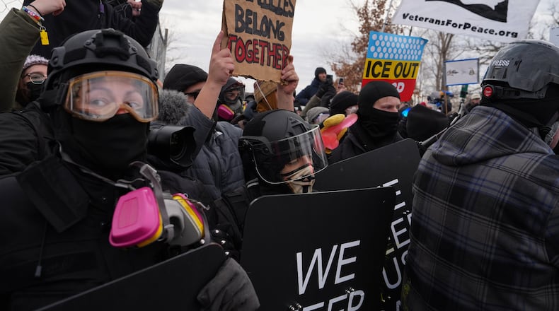 Counterprotesters demonstrate against Jake Lang on Saturday, Feb. 7, 2026, in Minneapolis. (AP Photo/Ryan Murphy)