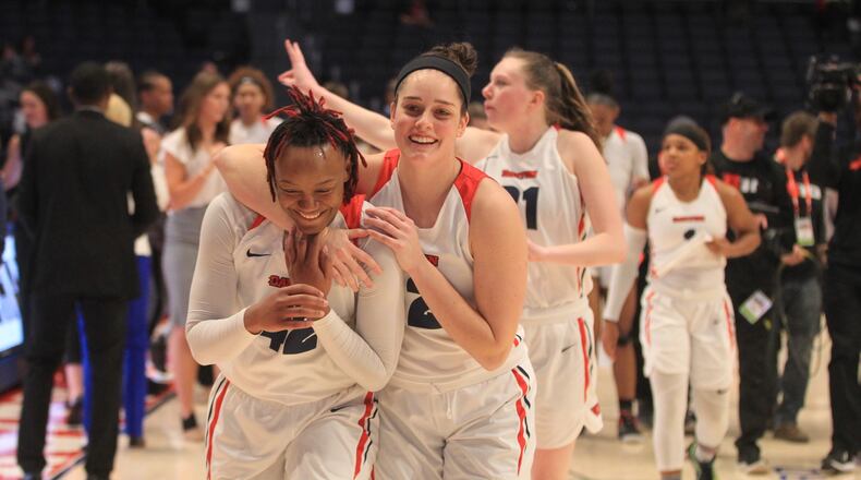 The Dayton women's team leaves the court after a victory in the A-10 semifinals on Saturday, March 7, 2020, at UD Arena.
