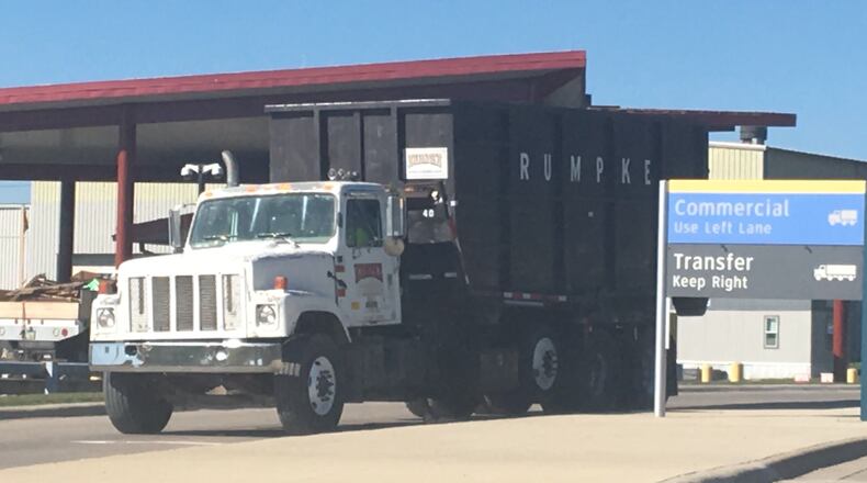 A Rumpke truck departs the Montgomery County Solid Waste District Transfer and Recycling Facility in Moraine in this October 2016 photo. CORNELIUS FROLIK / STAFF