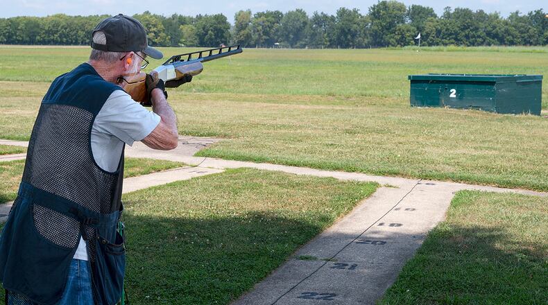 A shooter waits for a clay pigeon to fly from the trap house Aug. 24 on the Rod and Gun Club range at Wright-Patterson Air Force Base. Trap shooting is when the target flies away from the shooter. In skeet, it comes from the side and flies across the range. U.S. AIR FORCE PHOTO/R.J. ORIEZ
