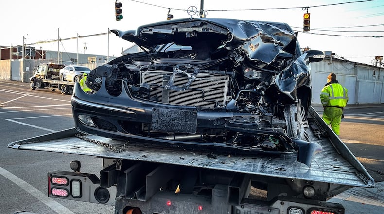 A woman driving a Mercedes on one rim did not pull over for Miami Twp. police Thursday afternoon, Nov. 18, 2021, which led to a pursuit that ended in a crash in Dayton. JIM NOELKER/STAFF