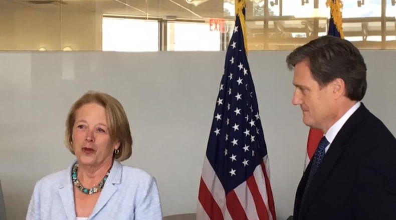 U.S. Rep. Nikki Tsongas, D-Mass., (at podium) and U.S. Rep. Mike Turner, R-Dayton, at a press conference in Dayton in August 2016. BARRIE BARBER/STAFF