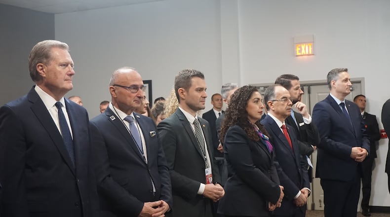 U.S. Rep. Mike Turner, left, with delegates from the NATO Parliamentary Assembly at the Richard Holbrooke Hope Hotel and Conference Center Sunday. Photo by Turner's staff.