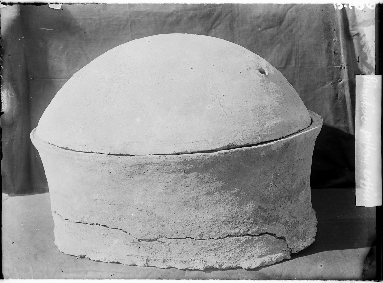 This photo provided by researchers shows a pottery vessel in which the remains of a man, radiocarbon dated to around 2855–2570 cal BCE, was discovered in Nuwayrat, Egypt. (Mahmoud Abd El Gelel/Garstang Museum of Archaeology/University of Liverpool via AP)