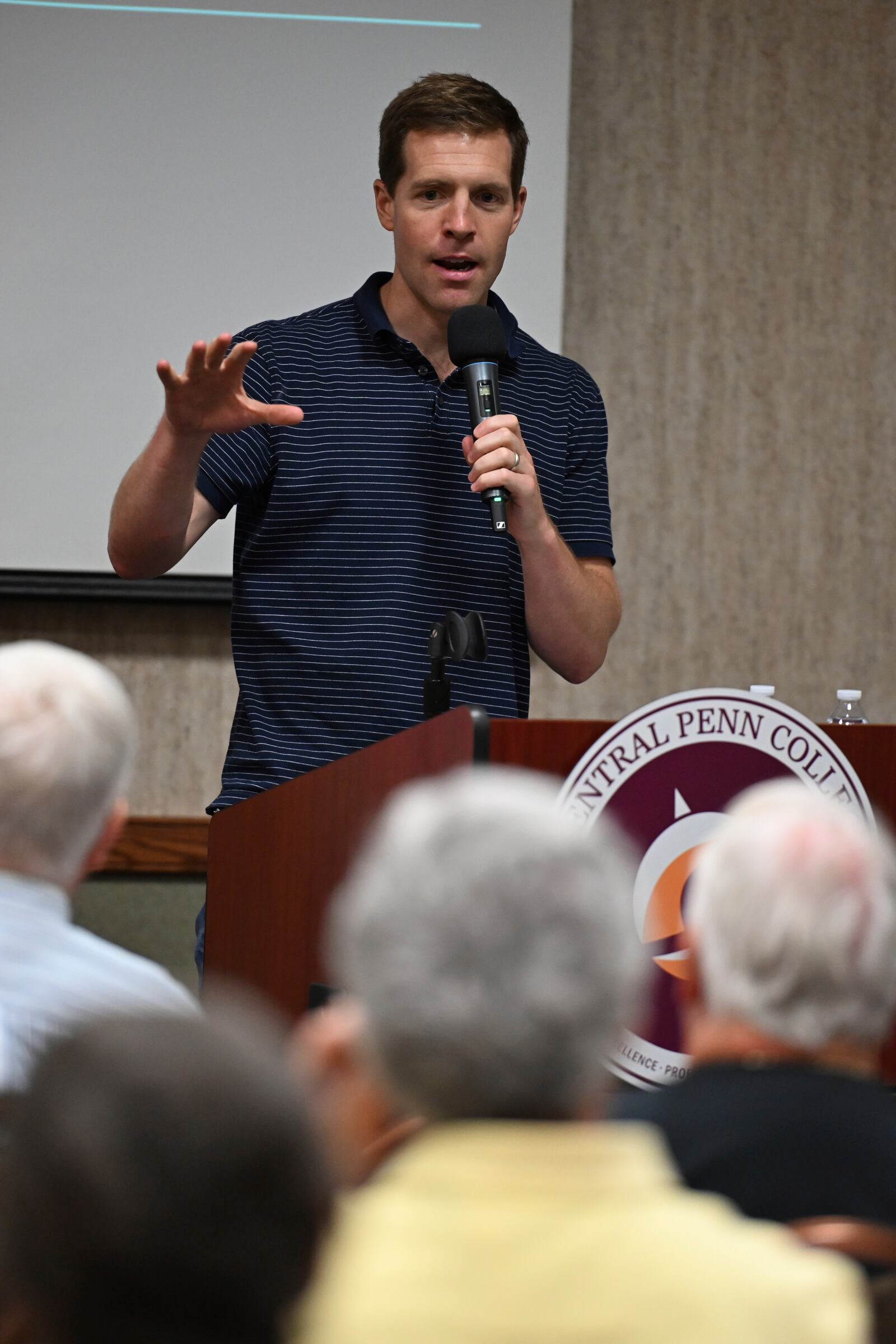 Conor Lamb speaks to the crowd at a town hall-style event organized by progressive groups at Central Penn College, Sunday, June 22, 2025, in Enola, Pa. (AP Photo/Marc Levy)