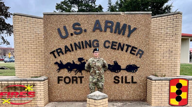 This photo provided by Andrew Coady shows his son, Declan Coady, posing for a photo on the day of his graduation at U.S. Army Training Center at Fort Sill, Okla., March 15, 2024. (Andrew Coady via AP)
