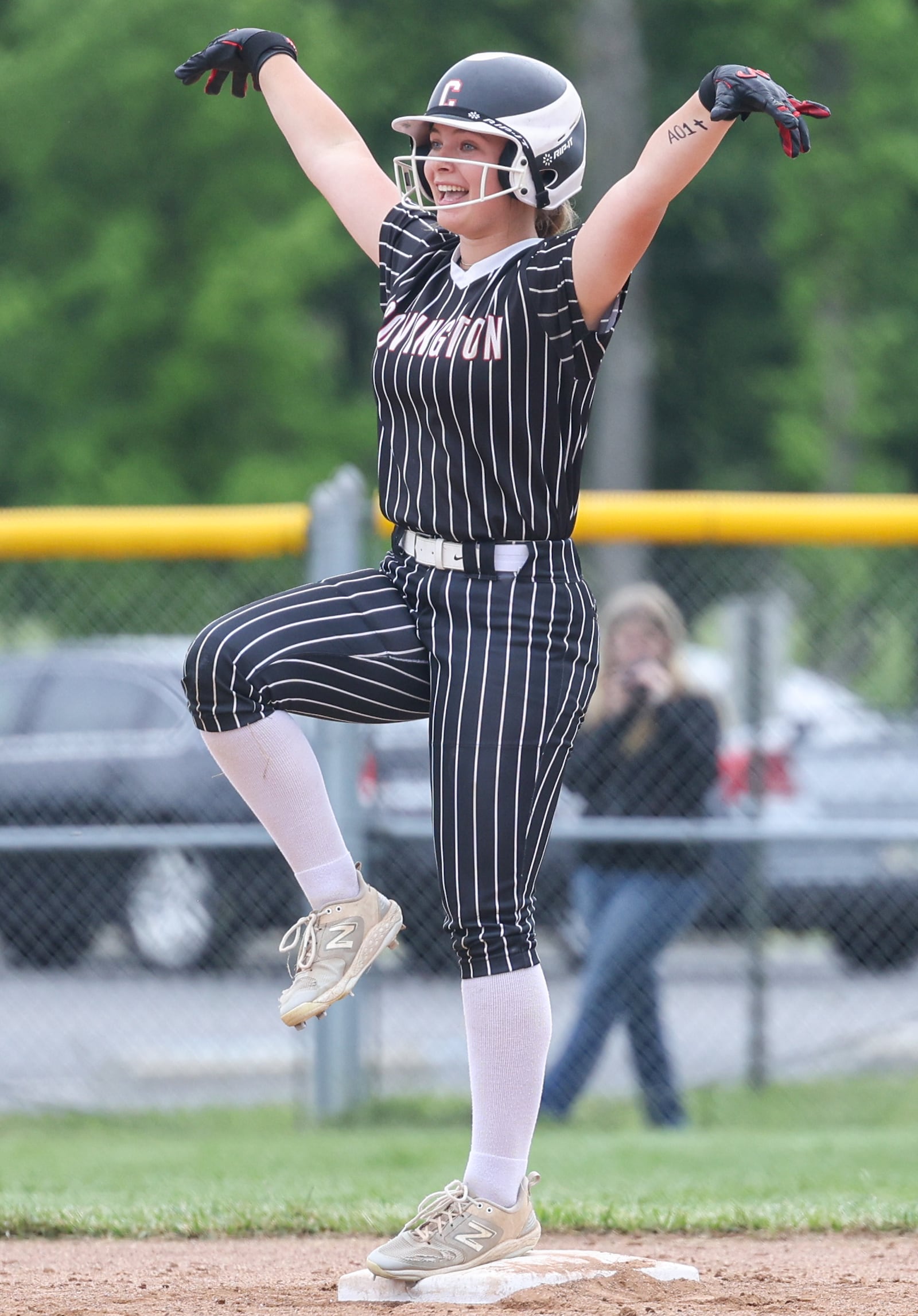 Covington sophomore Kylie Palsgrove poses after hitting a double in the fifth inning of a Division VII regional semifinal against Ansonia on Wednesday at Northmont High School. Palsgrove was 3 for 3 with 3 RBIs and two doubles and one walk. BRYANT BILLING / STAFF