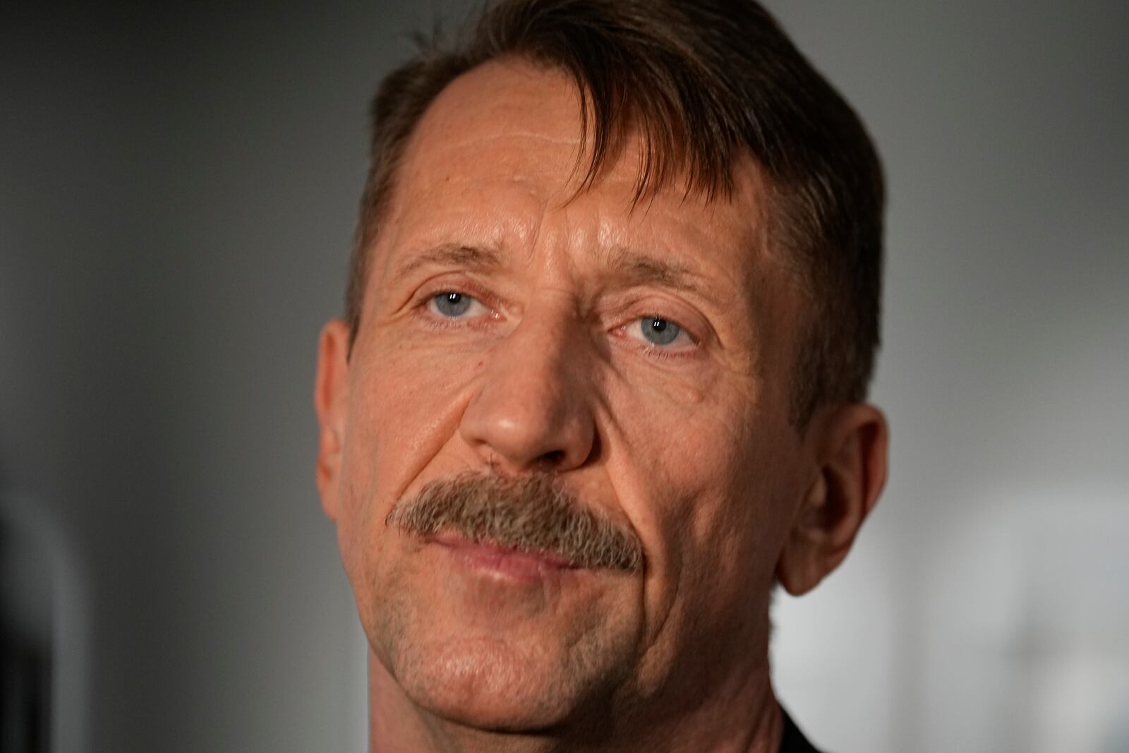 FILE – Russian arms dealer Viktor Bout, who was exchanged for U.S. basketball player Brittney Griner, speaks to the media at an opening for an exhibition of his artworks at the Mosfilm studio in Moscow, Russia, March 7, 2023. (AP Photo/Alexander Zemlianichenko, File)