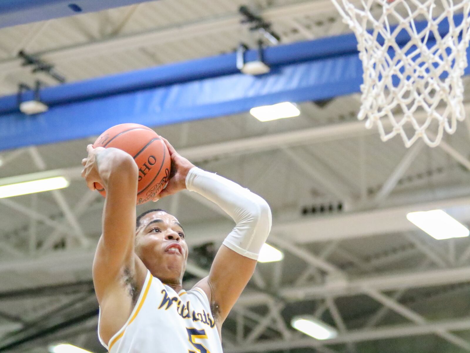 Springfield High School senior RaHeim Moss prepares to dunk the ball during the Wildcats’ 67-44 victory over Fairmont on Friday night. Moss had 14 points in the victory. CONTRIBUTED PHOTO BY MICHAEL COOPER