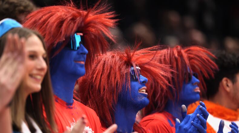 Dayton fans in the Red Scare student section cheer during a game against Ashland in an exhibition game on Saturday, Oct. 26, 2024, at UD Arena. David Jablonski/Staff
