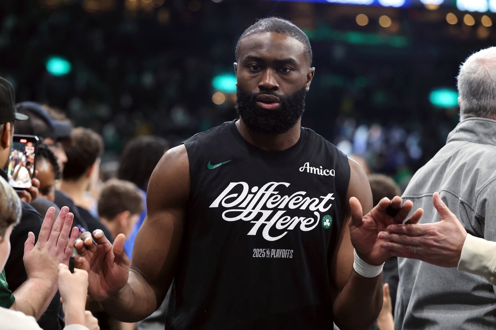 Boston Celtics' Jaylen Brown leaves the court after defeating the Orlando Magic in game 1 of a first-round NBA playoff basketball series Sunday, April 20, 2025, in Boston. (AP Photo/Michael Dwyer)