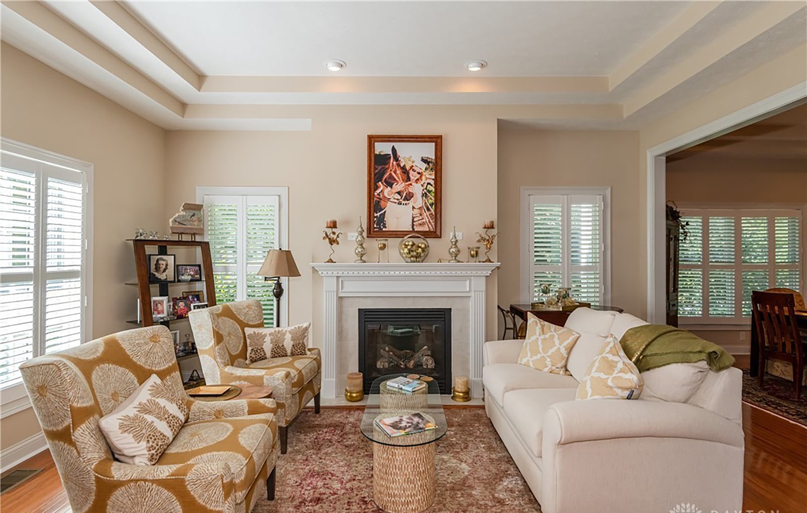 The home has a formal living room and dining room. Both have hardwood floors and the living room has a gas fireplace. CONTRIBUTED