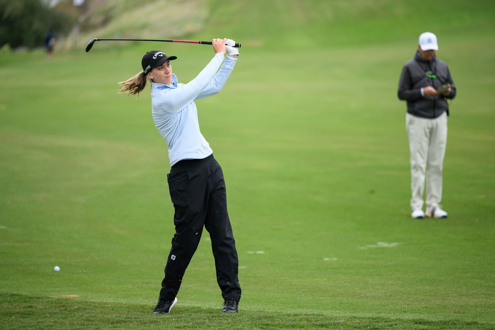 Jenny Coleman hits from the second fairway during the first round of the LPGA's JM Eagle LA Championship golf tournament at El Caballero Country Club Thursday, April 17, 2025, in Los Angeles. (AP Photo/William Liang)