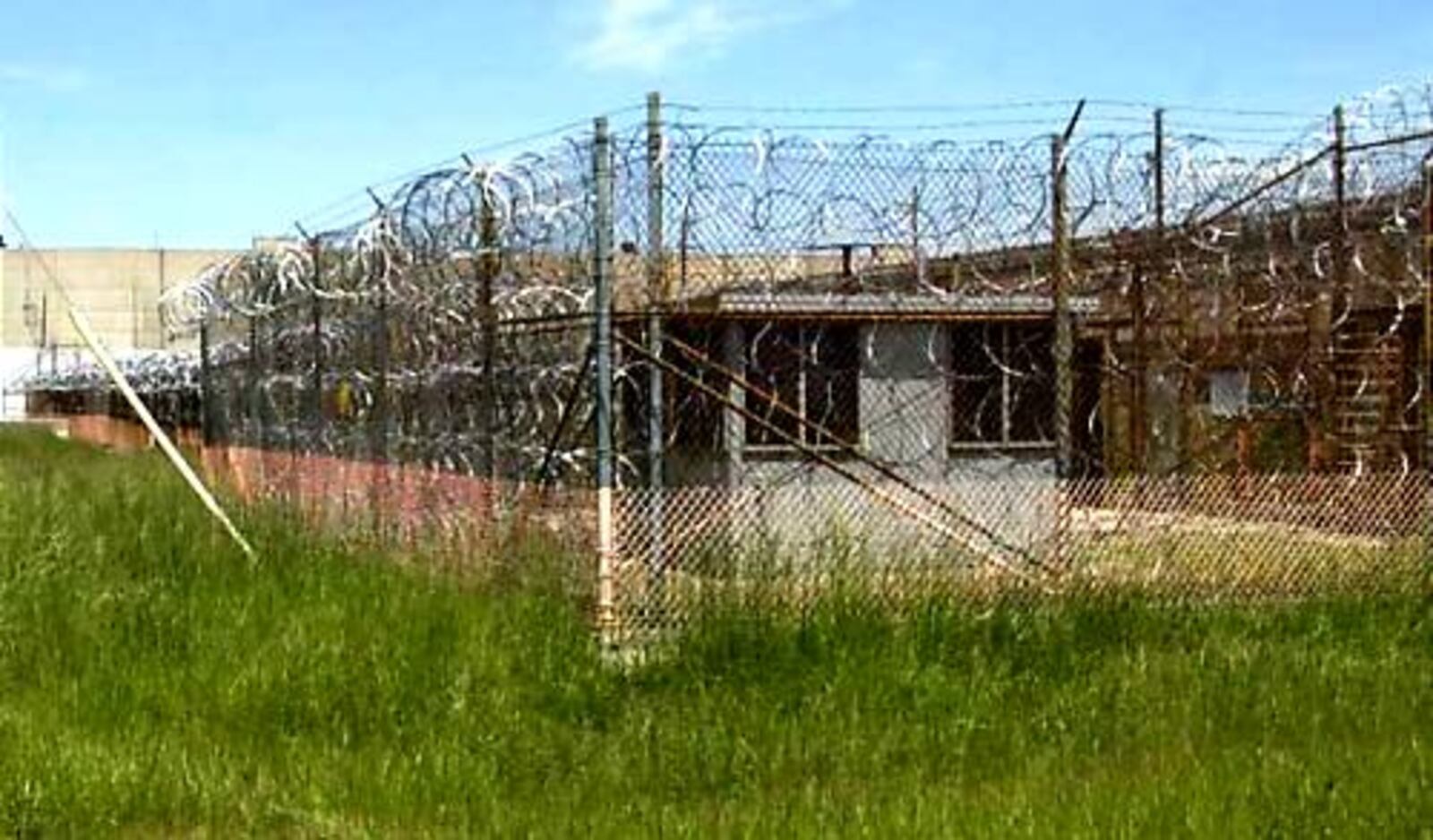 Razor wire surrounds a building at the Portsmouth Gaseous Diffusion Plant near Piketon. High security was necessary because the plant stored high enriched uranium for weapons.