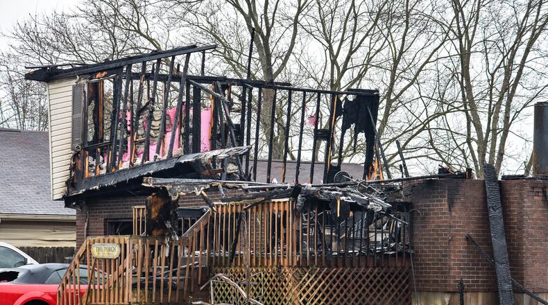 A huge fire destroyed two houses and damaged two more in the 6900 block of Torrington Drive in Franklin Township, according to Franklin Twp. Fire Chief Michael Hannigan. Hannigan said that they were first called to the scene at 11:07 p.m., and crews arrived to find heavy fire in the back of a house, which soon spread to the house next to it. NICK GRAHAM / STAFF