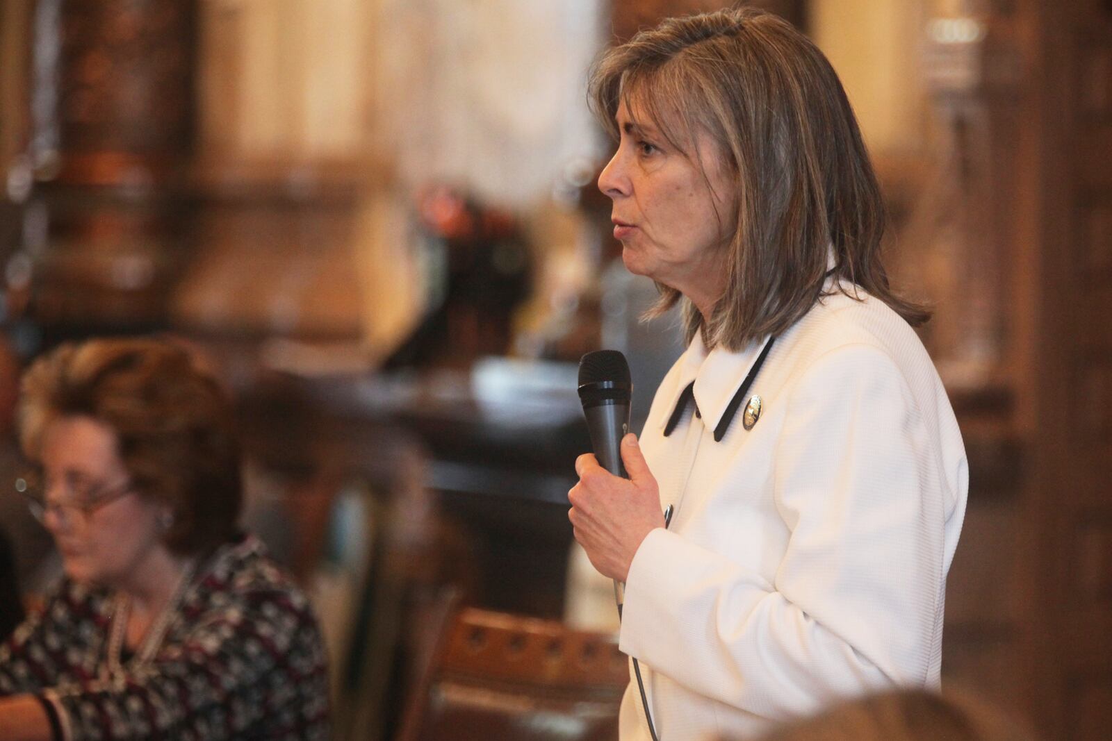 Kansas Senate Judiciary Committee Chair Kellie Warren, R-Leawood, speaks in favor of overriding Democratic Gov. Laura Kelly's veto of a bill that gives parents an income tax deduction for fetuses and embryos and requires a divorced or single parent's child support payments to begin at conception, Thursday, April 10, 2025, at the Statehouse in Topeka, Kan. (AP Photo/John Hanna)