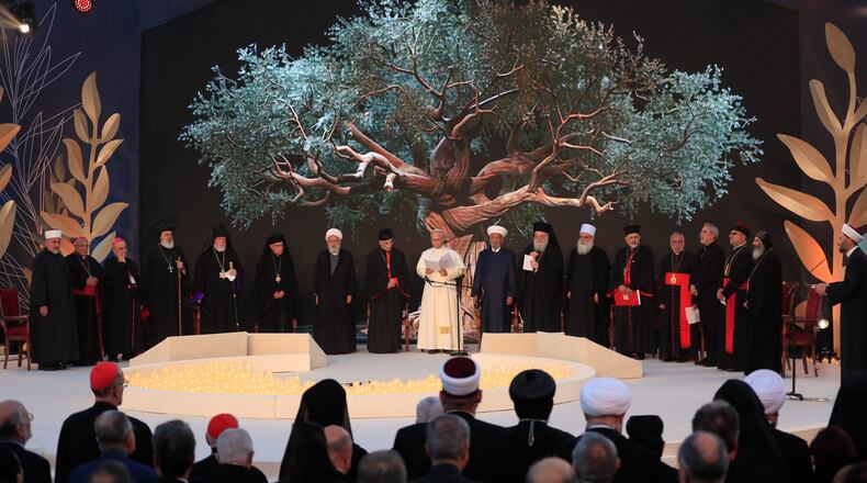 Pope Leo XIV, centre, attends an ecumenical and interreligious meeting at Martyrs' Square in downtown Beirut, Lebanon, Monday, Dec. 1, 2025. (AP Photo/Mohammad Zaatari)
