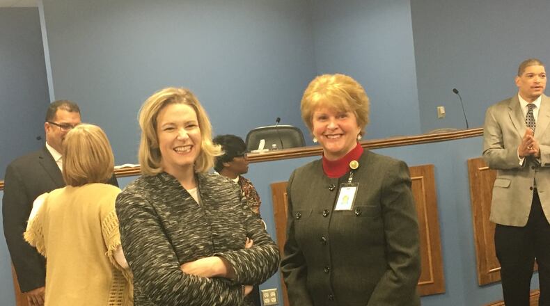 Dayton Mayor Nan Whaley (left) and Dayton Public Schools Acting Superintendent Elizabeth Lolli talk at a Jan. 4 press conference announcing a joint task force to study DPS facilities. JEREMY P. KELLEY / STAFF
