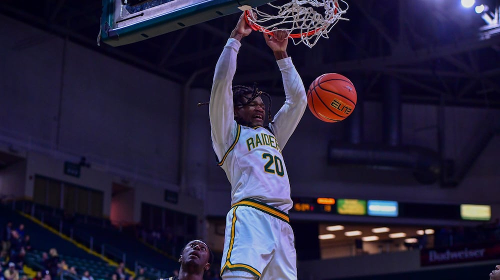 Wright State University's Andrea Holden finishes a dunk during their game against Oakland on Monday, Dec. 29 at Wright State's Nutter Center. JOSEPH R. CRAVEN / CONTRIBUTED PHOTO