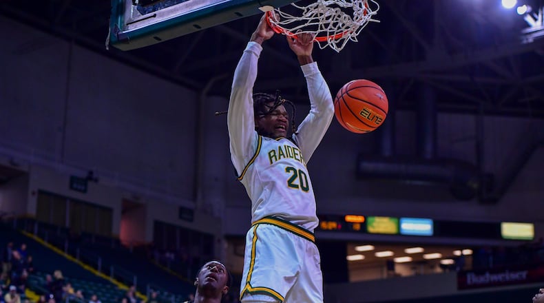 Wright State University's Andrea Holden finishes a dunk during their game against Oakland on Monday, Dec. 29 at Wright State's Nutter Center. JOSEPH R. CRAVEN / CONTRIBUTED PHOTO