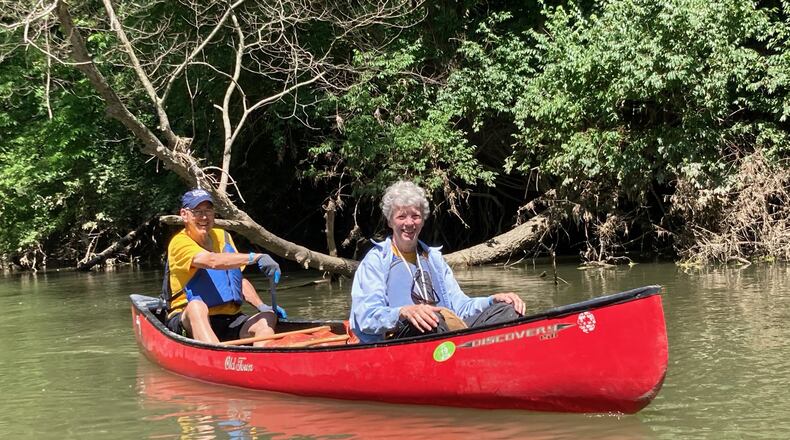 Former Ohio First Lady Hope Taft, left, and former Gov. Bob Taft participate in the Little Miami River Kleeners Clean Sweep on June 7 near Spring Valley. David Jablonski/Staff