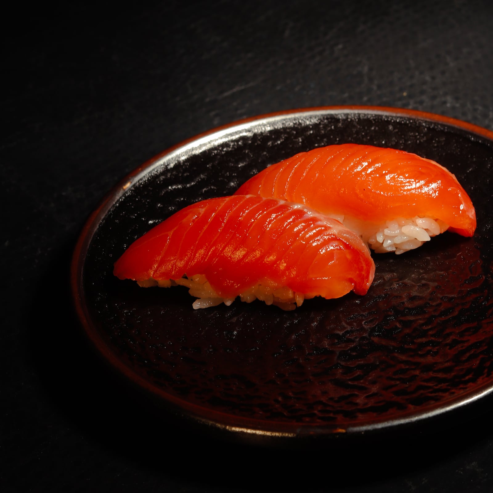 DŌZO serves premium sushi in an underground setting and offers two ways to dine: a seven-course chef’s counter experience, and a standard menu for guests who prefer to order à la carte. CONTRIBUTED