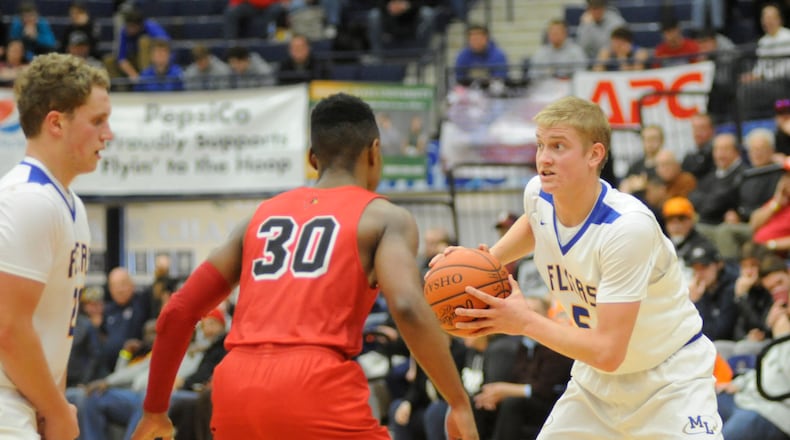 Nathan Bruns (with ball) hit the game-winning 3-pointer. MARC PENDLETON / STAFF