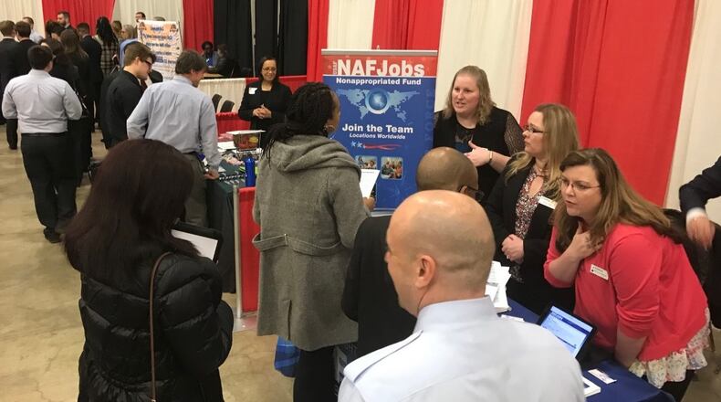 Area people attend a OhioMeansJobs Montgomery County and Wright-Patterson Air Force Base career fair at the Dayton Convention Center in April. FILE
